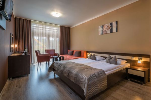 Apartmán s manželskou postelí a rozkládacím gaučem pro děti